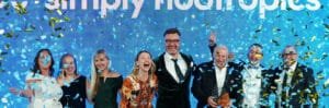 The joyful Elegant Clean team celebrate their prestigious 2degrees Auckland Business Awards nomination under a shower of blue and gold confetti at an Auckland venue.