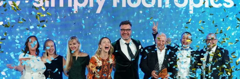 The joyful Elegant Clean team celebrate their prestigious 2degrees Auckland Business Awards nomination under a shower of blue and gold confetti at an Auckland venue.